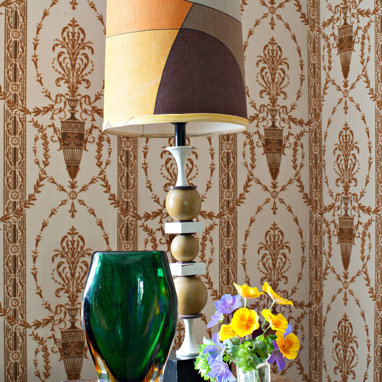 table with lamp and flowers